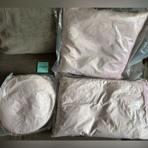 3 Anthropologie Pillows pink/rose color